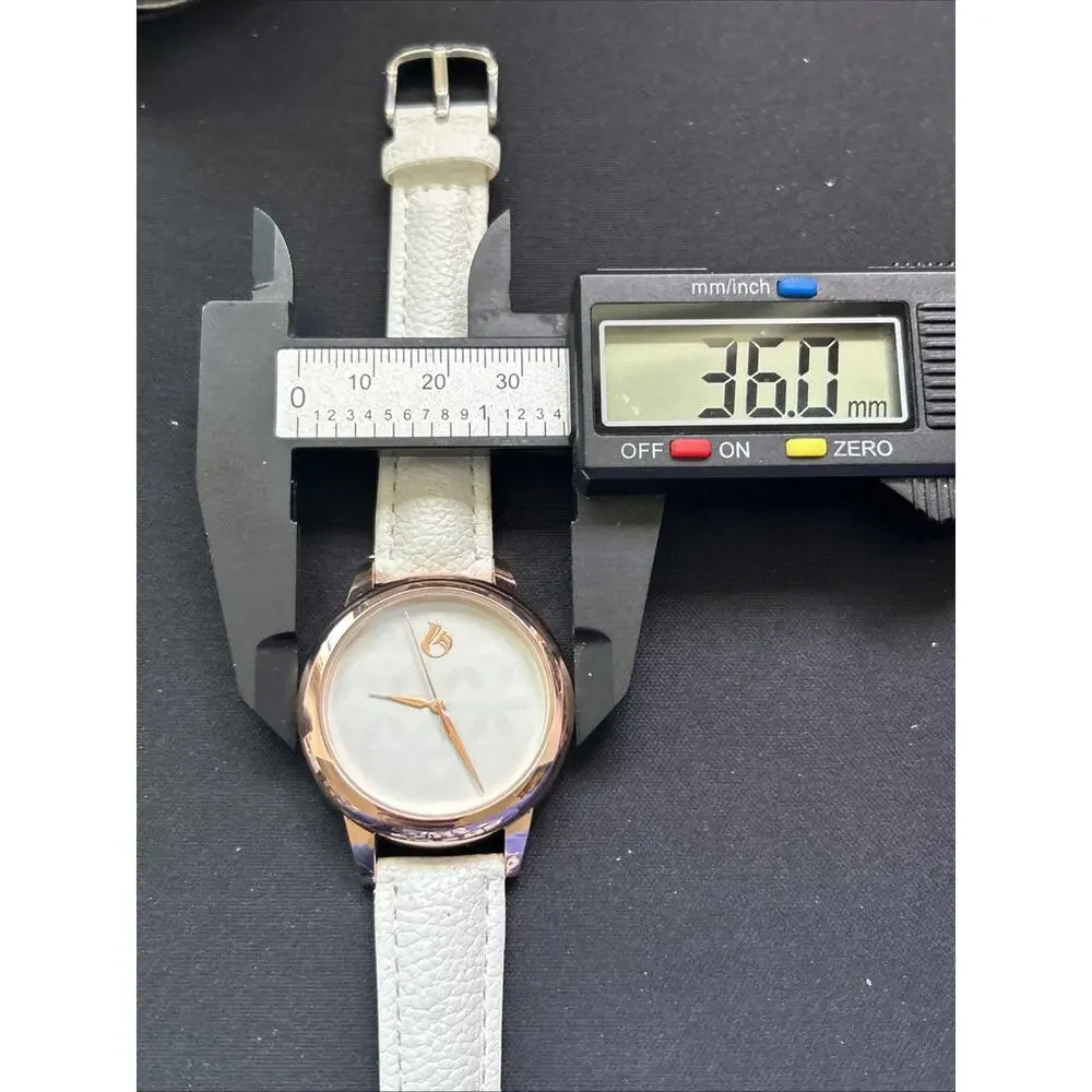 Rose Gold Tone White Dial And Band Women’s Quartz Watch